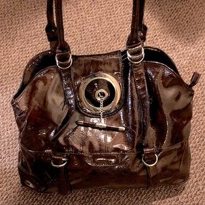 Large women’s brown shoulder bag /handbag with floral lining.